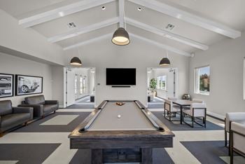 Two story clubhouse with lounge, game room, & tv lounge