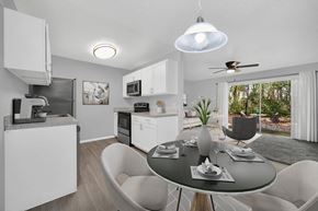 Orlando apartment for rent - a kitchen and dining room at Southern Oaks Residences