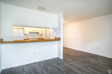 Clearwater apartment for rent - A kitchen with white walls and a wooden countertop.