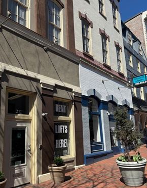 Wilmington apartment for rent - A building with a sign that says "Lofts Here!" is shown.
