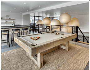 Salt Lake apartment for rent - A pool table in a room with a bar area.