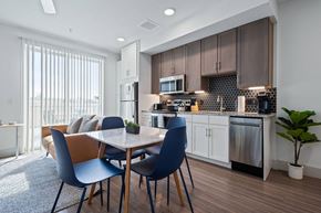 Austin apartment for rent - Dining And Kitchen at Placemakr Downtown Austin, Austin, TX 78701