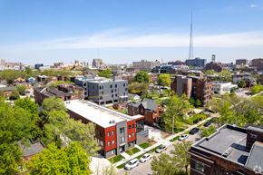 Detroit apartment for rent - A cityscape with a mix of residential and commercial buildings.