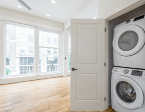 Knoxville apartment for rent - a laundry room with a front load washer and dryer