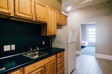 Grand Rapids apartment for rent - a kitchen with a sink and a refrigerator