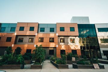 Grand Rapids apartment for rent - the outside of a building with plants in front of it