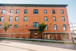 Grand Rapids apartment for rent - brick building inclined streetscape