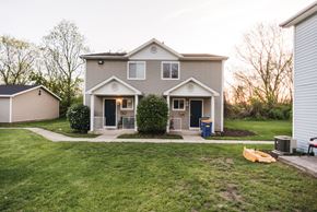Grand Rapids apartment for rent - apartment community duplex beige siding white trim