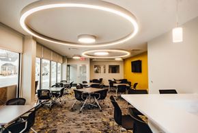 Grand Rapids apartment for rent - community room with seating modern light fixtures