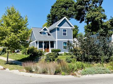 Grand Rapids apartment for rent - a blue house with a lawn and trees