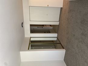 Mcminnville apartment for rent - A white cabinet with a drawer is open.
