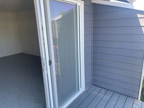Newberg apartment for rent - A sliding glass door on a house.