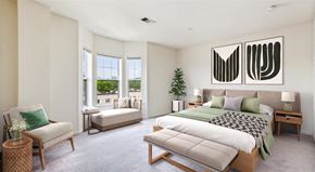 Bronxville apartment for rent - a bedroom with a bed sitting next to a window
