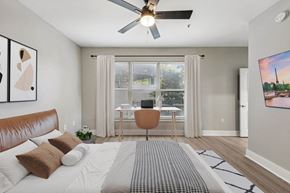Atlanta apartment for rent - a bedroom with a bed and a ceiling fan