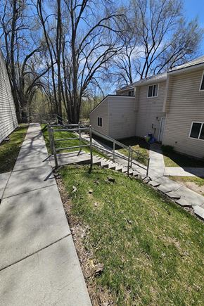Pocatello apartment for rent - Image of stairs between buildings on the El Rancho property