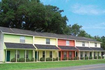 Kingsland apartment for rent - a house with different colors on the side of a street