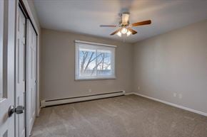 Hartland apartment for rent - a bedroom with a ceiling fan and a window