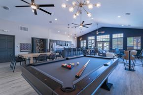 Plover apartment for rent - a pool table and bar in a resident clubhouse