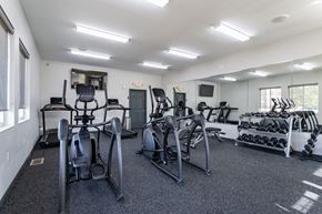 Plover apartment for rent - a gym with cardio equipment and weights