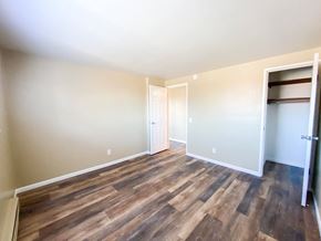 Madison apartment for rent - a living room with wood flooring and a closet