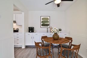 Oak Creek apartment for rent - A dining room with a wooden table and chairs.