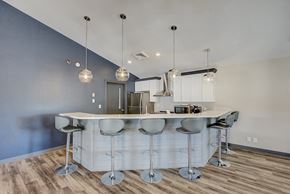 Waukesha townhouse for rent - a kitchen with an island and stools