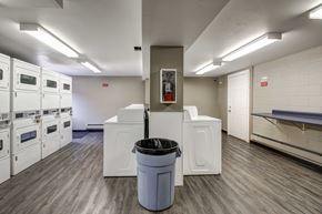 Madison apartment for rent - A large room with a trash can in the middle of it.