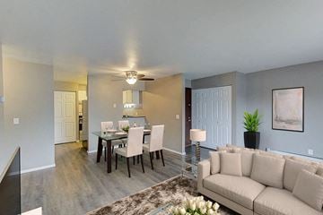 Appleton apartment for rent - a living room and dining room with a couch and a table