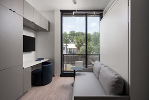 Los Angeles Ca 90028 apartment for rent - A modern kitchen with a large window overlooking a balcony.