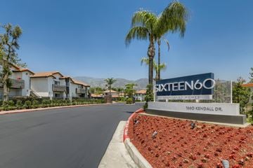 San Bernardino apartment for rent - A street view of a residential area with a sign for Sixteen60.