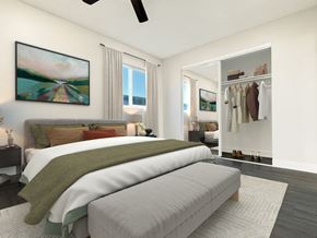 San Bernardino apartment for rent - A bedroom with a large bed and a painting on the wall.