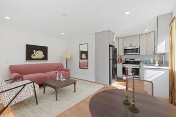 Los Angeles apartment for rent - A living room with a red couch and a coffee table.