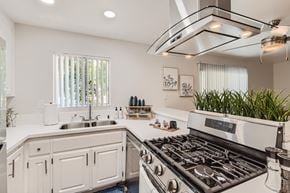 Ontario apartment for rent - Electric Range In Kitchen at Carmel at the Colony, Ontario, CA, 91761
