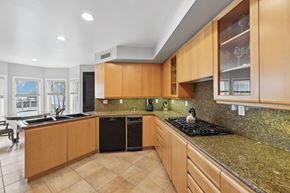Los Angeles apartment for rent - the kitchen has granite counter tops and wooden cabinets