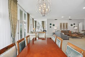Los Angeles apartment for rent - a dining room with a long wooden table and chairs