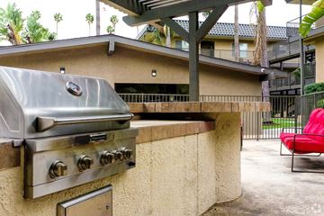 Anaheim apartment for rent - A silver outdoor grill is on a concrete counter.