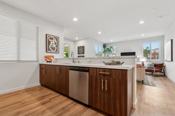 Soft-close cabinetry with brushed nickel fixtures