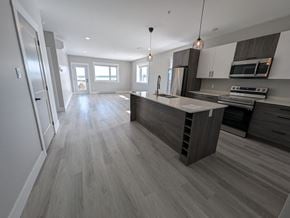 Miramichi apartment for rent - a kitchen with a large island in the middle