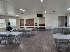 Kokomo apartment for rent - a conference room with tables and chairs and a christmas tree