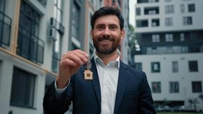 Matawan apartment for rent - a man wearing a suit and holding a key