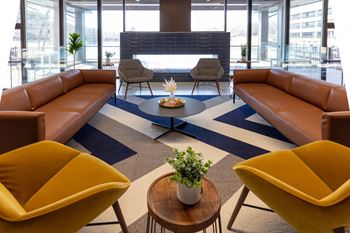Clubhouse w/ fireplace and lake view