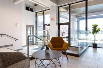 Saint Louis apartment for rent - a living room with a yellow chair and a table