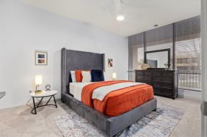 Saint Louis apartment for rent - a bedroom with a bed and a window at The Residences at Tesson Ridge, Saint Louis