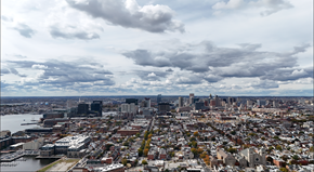 Baltimore apartment for rent - A cityscape with a cloudy sky above it.