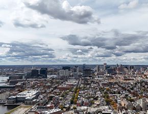 Baltimore apartment for rent - A cityscape with a cloudy sky above it.