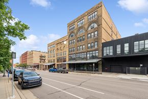 Minneapolis apartment for rent - a large brick building on a city street at Gaar Scott Historic Lofts, Minnesota, 55401