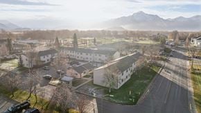 Palmer apartment for rent - A view of a residential area with houses and a mountain in the background.