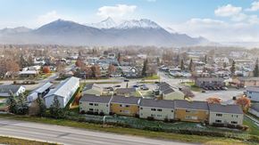 Palmer apartment for rent - A small town with a mountain in the background.
