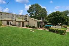 Charlotte apartment for rent - A sunny day at the apartment complex with a swimming pool.