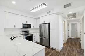 Goleta apartment for rent - A kitchen with a white counter top and a refrigerator.